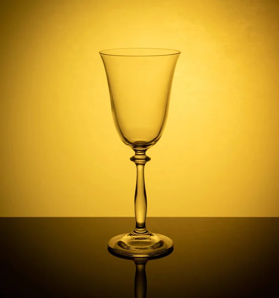 Glass Wine Glowing Orange Background Reflected Mirror Surface Table — Fotografia de Stock
