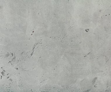 Betonu taklit eden gri alçının arka planı.
