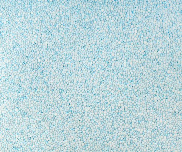 ポリスチレンの製造からの粒状の白色青色の背景 — ストック写真