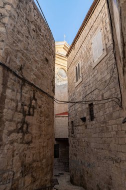 View from Les Freres street to the Saint saviour monastry in the Old City of Jerusalem, in Israel