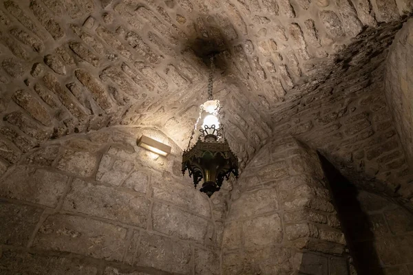 Bethlehem Israel December 2021 Lamp Hangs Ceiling Underground Hall Wall — стоковое фото