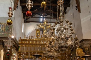 Bethlehem, Israel, December 25, 2021 : The interior of the main hall of the Church of Nativity in Bethlehem in the Palestinian Authority, Israel