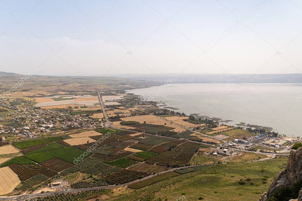 View from Mount Arbel to the adjacent valley and villages on the coast of Lake Kinneret - the Sea of Galilee, near the city of Tiberias, in northern Israel