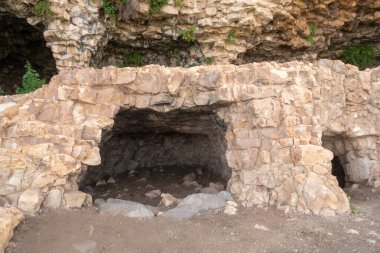 The remains of the buildings of the ancient settlement on Mount Arbel, located on the coast of Lake Kinneret - the Sea of Galilee, near the city of Tiberias, in northern Israel