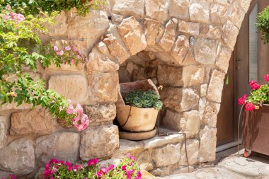 A decorative broken plant pot is found in a niche in the Arab Christian village Miilya, in the Galilee, in northern Israel