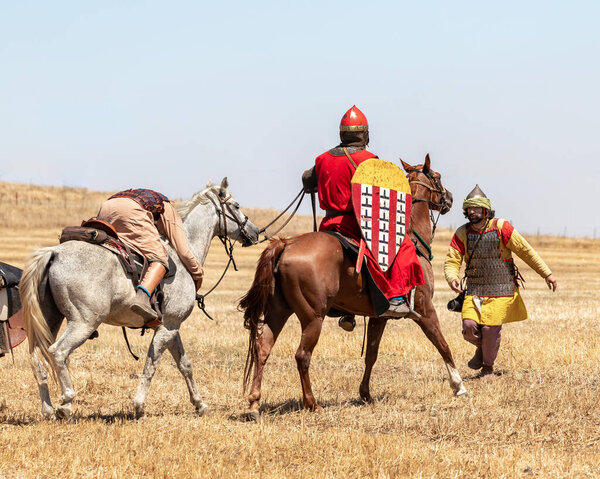 Tiberias, Israel, July 01, 2022 : Participants in the reconstruction of Horns of Hattin battle in 1187 participate in the battle on the battlefield near Tiberias, Israel