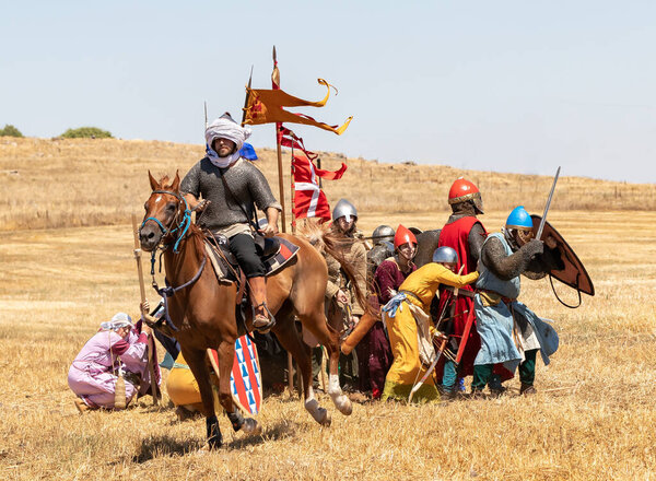 Tiberias, Israel, July 01, 2022 : Participants in the reconstruction of Horns of Hattin battle in 1187 participate in the battle on the battlefield near Tiberias, Israel