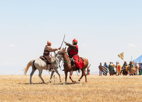 Tiberias, Israel, July 01, 2022 : Participants in the reconstruction of Horns of Hattin battle in 1187 participate in the battle on the battlefield near Tiberias, Israel