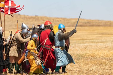 Tiberias, Israel, July 01, 2022 : Participants in the reconstruction of Horns of Hattin battle in 1187 participate in the battle on the battlefield near Tiberias, Israel
