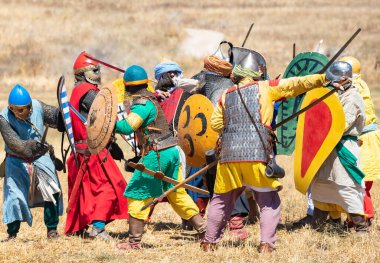 Tiberias, Israel, July 01, 2022 : Participants in the reconstruction of Horns of Hattin battle in 1187 participate in the battle on the battlefield near Tiberias, Israel