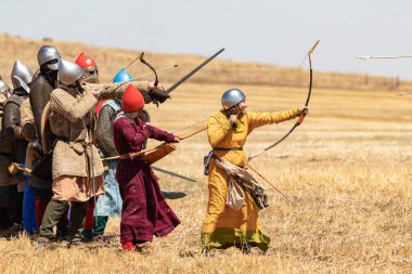 Tiberias, Israel, July 01, 2022 : Participants in the reconstruction of Horns of Hattin battle in 1187 participate in the battle on the battlefield near Tiberias, Israel