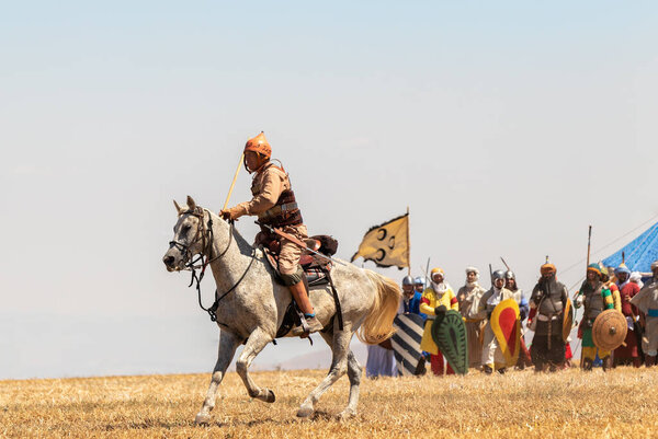Tiberias, Israel, July 01, 2022 : Participants in the reconstruction of Horns of Hattin battle in 1187 participate in the battle on the battlefield near Tiberias, Israel