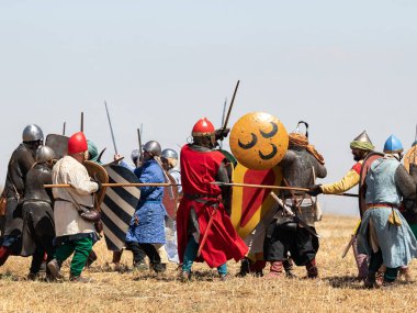Tiberias, Israel, July 01, 2022 : Participants in the reconstruction of Horns of Hattin battle in 1187 participate in the battle on the battlefield near Tiberias, Israel