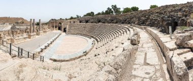 Beit Shean, Israel, August 06, 2022 : The amphitheater on the partially restored ruins of one of the cities of the Decapolis - the ancient Hellenistic city of Scythopolis near Beit Shean city in northern Israel