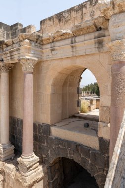 Beit Shean, Israel, August 06, 2022 : The amphitheater on the partially restored ruins of one of the cities of the Decapolis - the ancient Hellenistic city of Scythopolis near Beit Shean city in northern Israel
