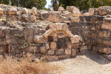 Beit Shean, Israel, August 06, 2022 : Partially restored ruins of one of the cities of the Decapolis - the ancient Hellenistic city of Scythopolis near Beit Shean city in northern Israel