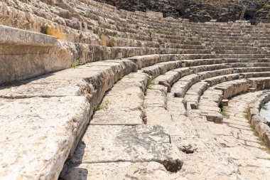 Beit Shean, Israel, August 06, 2022 : The amphitheater on the partially restored ruins of one of the cities of the Decapolis - the ancient Hellenistic city of Scythopolis near Beit Shean city in northern Israel