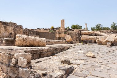 Beit Shean, Israel, August 06, 2022 : Partially restored ruins of one of the cities of the Decapolis - the ancient Hellenistic city of Scythopolis near Beit Shean city in northern Israel