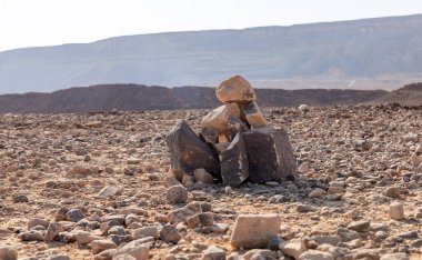 Stone sculptures made by tourists in the stone Judean desert in southern Israel