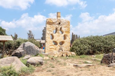 Haifa, Israel, August 20, 2022 : Stone exhibit in the Dagan Shklovsky Sculpture Park - Psalm Garden, in Ein Carmel, northern Israel