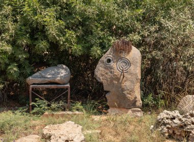 Haifa, Israel, August 20, 2022 : Stone exhibit in the Dagan Shklovsky Sculpture Park - Psalm Garden, in Ein Carmel, northern Israel