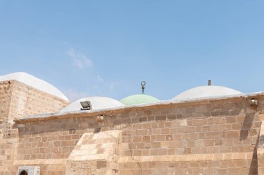 Jerusalem, Israel, August 11, 2022 : The Muslim shrine - the complex of the grave of the prophet Moses in the old Muslim cemetery, near Jerusalem, in Israel
