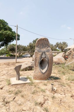 Haifa, Israel, August 20, 2022 : Stone exhibit in the Dagan Shklovsky Sculpture Park - Psalm Garden, in Ein Carmel, northern Israel