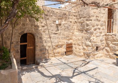 Jerusalem, Israel, August 11, 2022 : The Muslim shrine - the complex of the grave of the prophet Moses in the old Muslim cemetery, near Jerusalem, in Israel