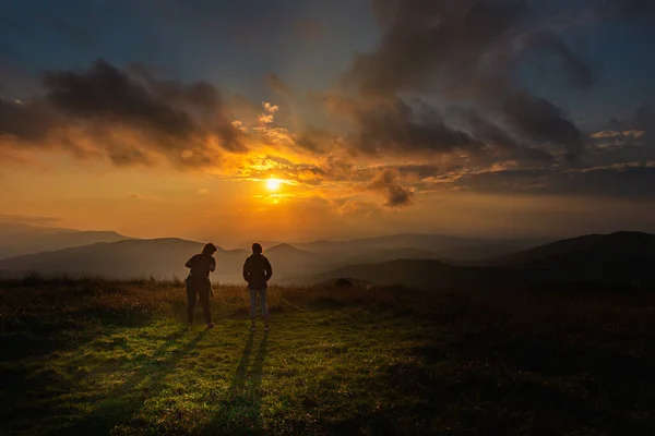Two Shadows Dance with Their Hikers Amongst the Max Patch Sunset