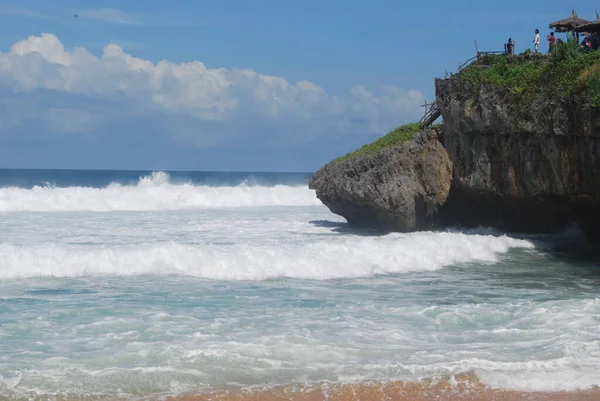 big rock in the waves