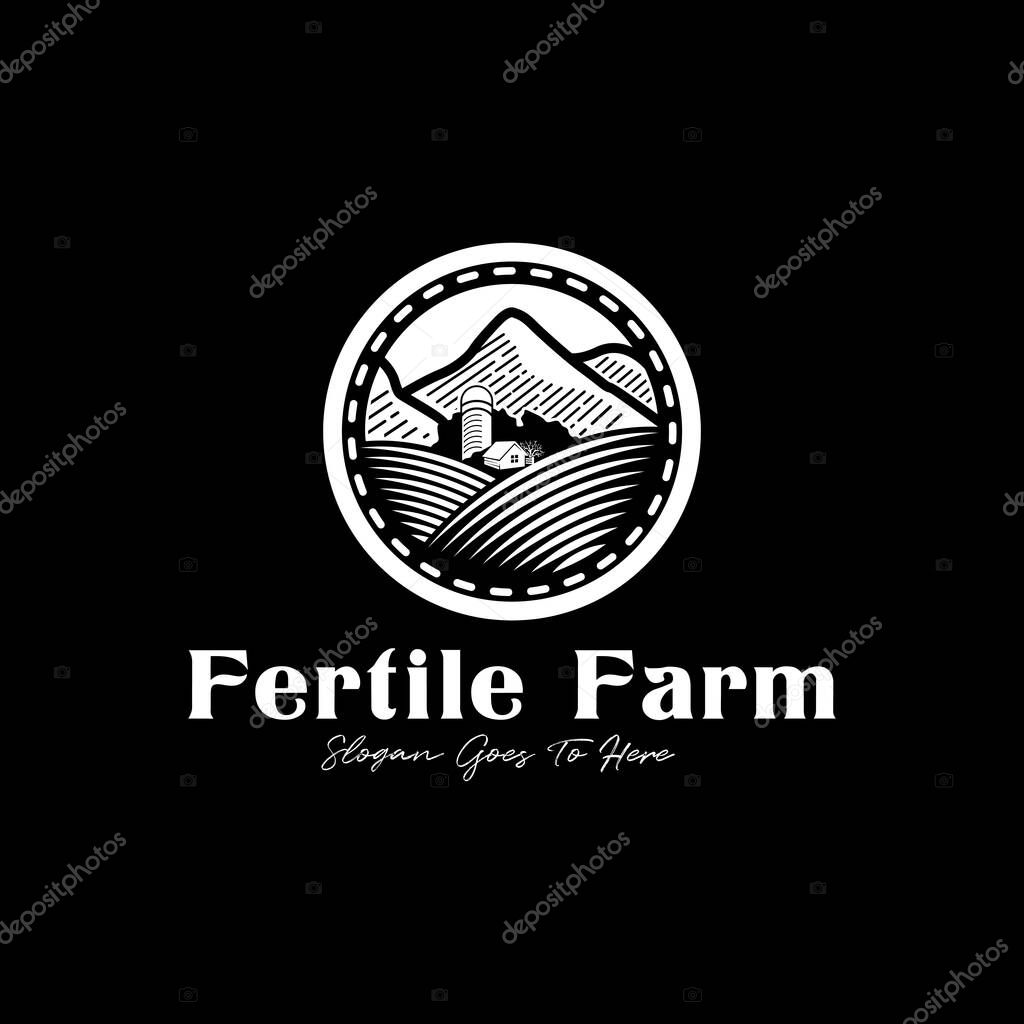 Fertile farmland circle logo with mountains and barns design inspiration