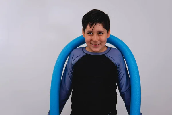 Boy Black Swimsuit Using Blue Foam Tube Pool Boy Swimsuit — стоковое фото
