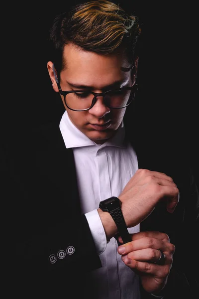 Blond Boy Dressed Suit Watch His Wrist Black Background Business — Stok fotoğraf