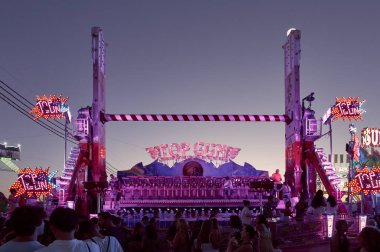 Fairground attraction with led lights at night