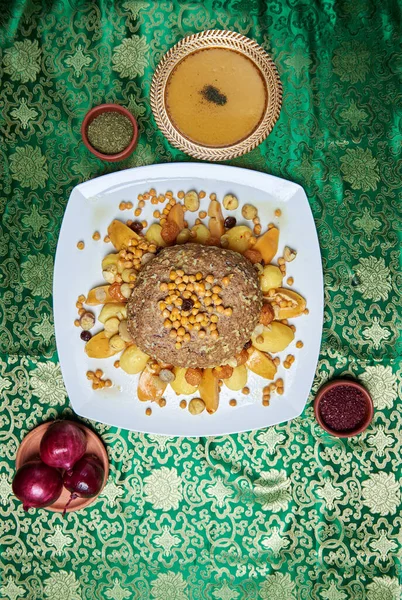 National Azerbaijani cuisine name of the dish Arzuman Kifta Big size  large meatball stuffed with dried fruits