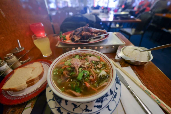 Chinese restaurant delicious food with vegetables and duck meat