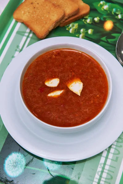 An exclusive Russian borscht and bread .
