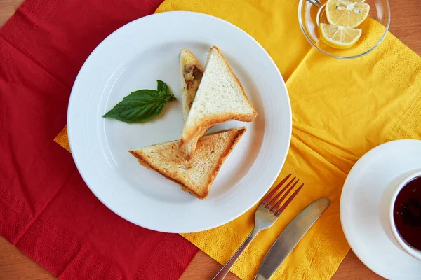 Morning breakfast sandwiches and tea meal