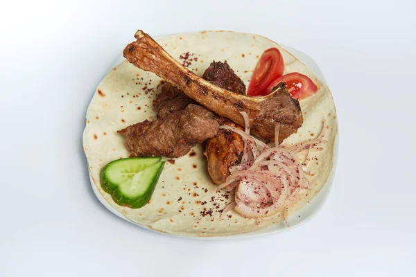 Azerbaijani Lamb  kabab with onion studio shot 