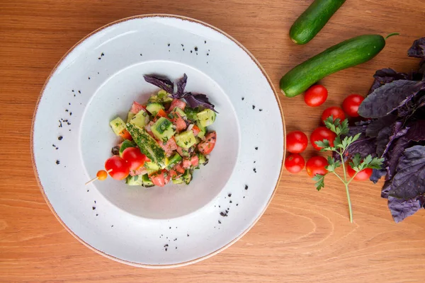 Vegetable salad of tomatoes and cucumbers fresh