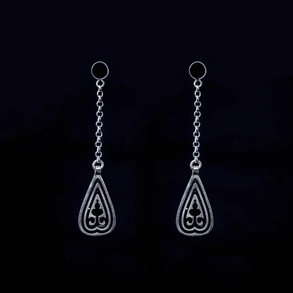 Azerbaijanian Antique jewelry black background earrings museum exhibit