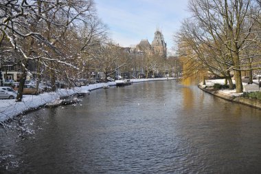 Amsterdam winter snow canal Amstel city center
