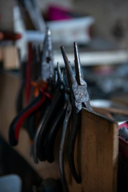 weapons workshop work environment weapons restoration supplies pliers tools