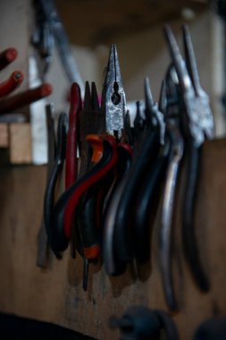 weapons workshop work environment weapons restoration supplies pliers tools