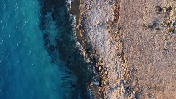 Flying Rocky Coastline Alongside Cliffside Blue Mediterranean Sea Ocean Water — Vídeos de Stock