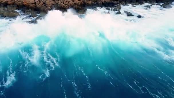 Sea Washes Rocky Shore Aerial Shot Flying Coastline Cliffside Blue — Stockvideo