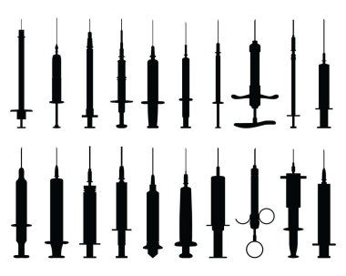 Black silhouettes of syringes on a white background