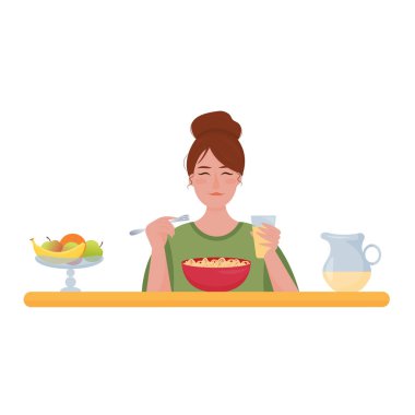 Kız kahvaltı yapıyor. Doğal yemek yiyen bir kadın.