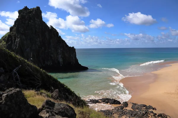 View of Two Brothers Mountain - Morro dos Dois Irmaos in Portuguese- from Cacimba do Padre beach in Fernando de Noronha, Brazil. High quality photo