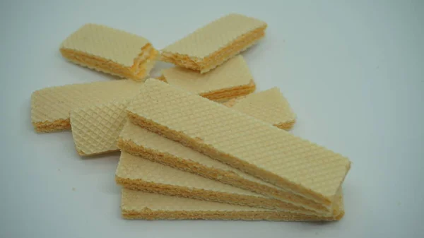 Lekkere Wafeltjes Witte Achtergrond Plat Gelegd Zoet Voedsel — Stockfoto